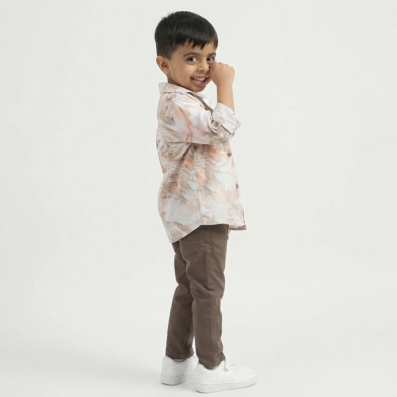 Toddler Boy Casual Outfit with Printed Overshirt, Graphic Tee, Brown Pants.