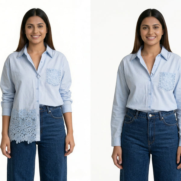 A woman wearing a light blue button-down shirt with lace detailing and an embroidered pocket, paired with dark blue jeans.