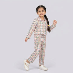 Little girl wearing pink checked co-ord set with cropped shirt and matching straight pants stylish kids outfit