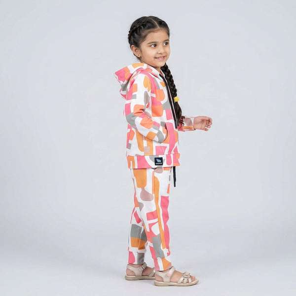 Little girl wearing multicolor printed hoodie and matching jogger co-ord set casual trendy outfit for kids