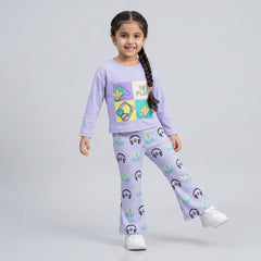 Little girl wearing graphic sweatshirt and matching printed flared pants co-ord set casual outfit for kids