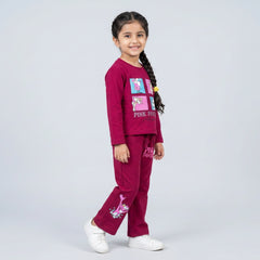 Little girl wearing maroon Pink Panther printed co-ord set with sweatshirt and wide-leg pants for kids casual wear