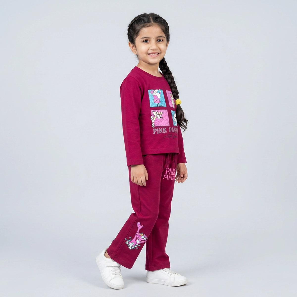 Little girl wearing maroon Pink Panther printed co-ord set with sweatshirt and wide-leg pants for kids casual wear