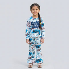 Little girl wearing white and blue graphic printed co-ord set with full sleeve top and matching pants for kids casual wear