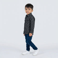 Young boy wearing grey printed shirt with denim jeans smart casual kids outfit
