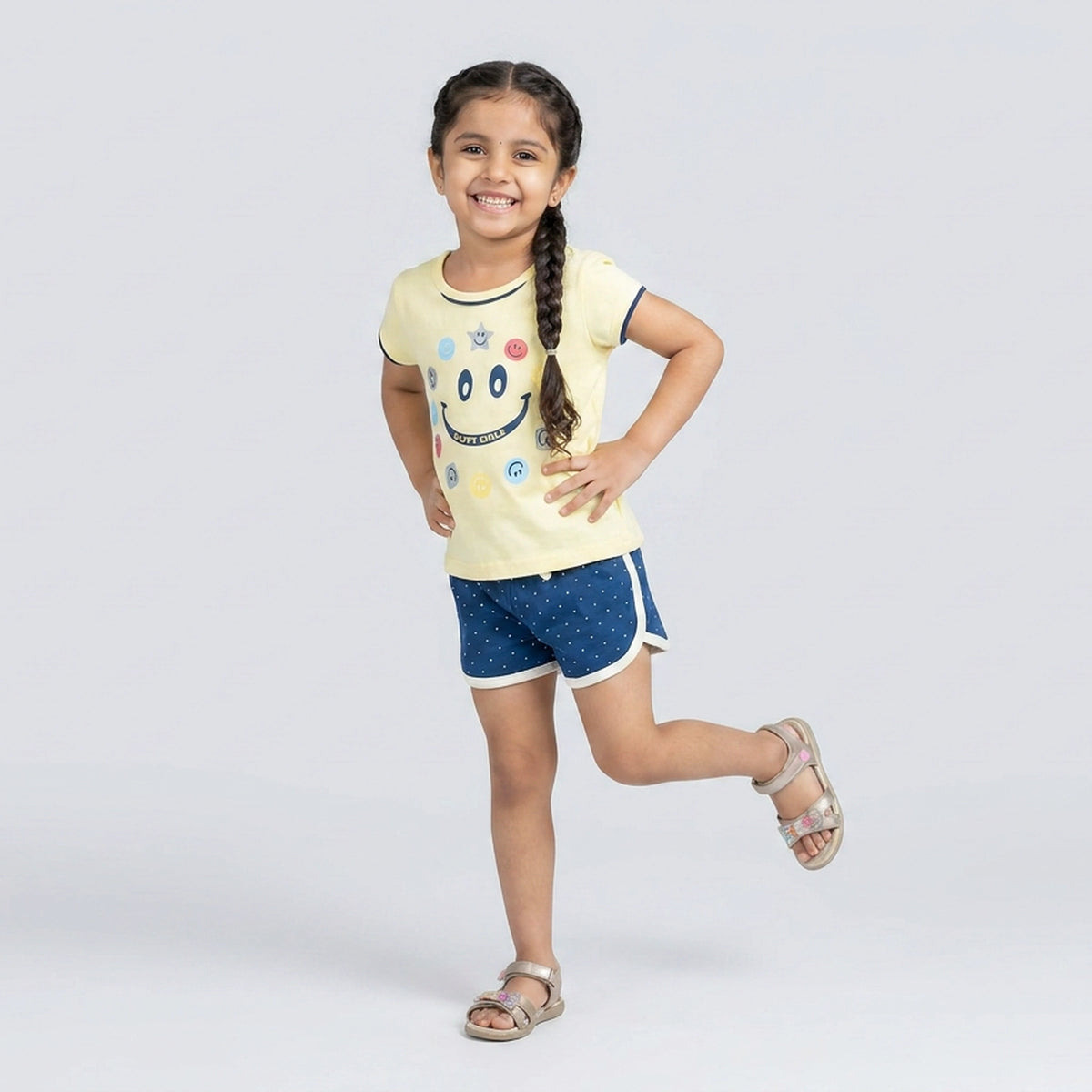 Girls Yellow Smiley Print T-Shirt with Green Polka Dot Shorts Set