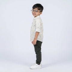 Boys Geometric Print Casual Shirt with Dark Pants and White Sneakers