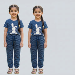 Little girl wearing navy blue striped cotton co-ord set with bunny print top and matching jogger pants for kids