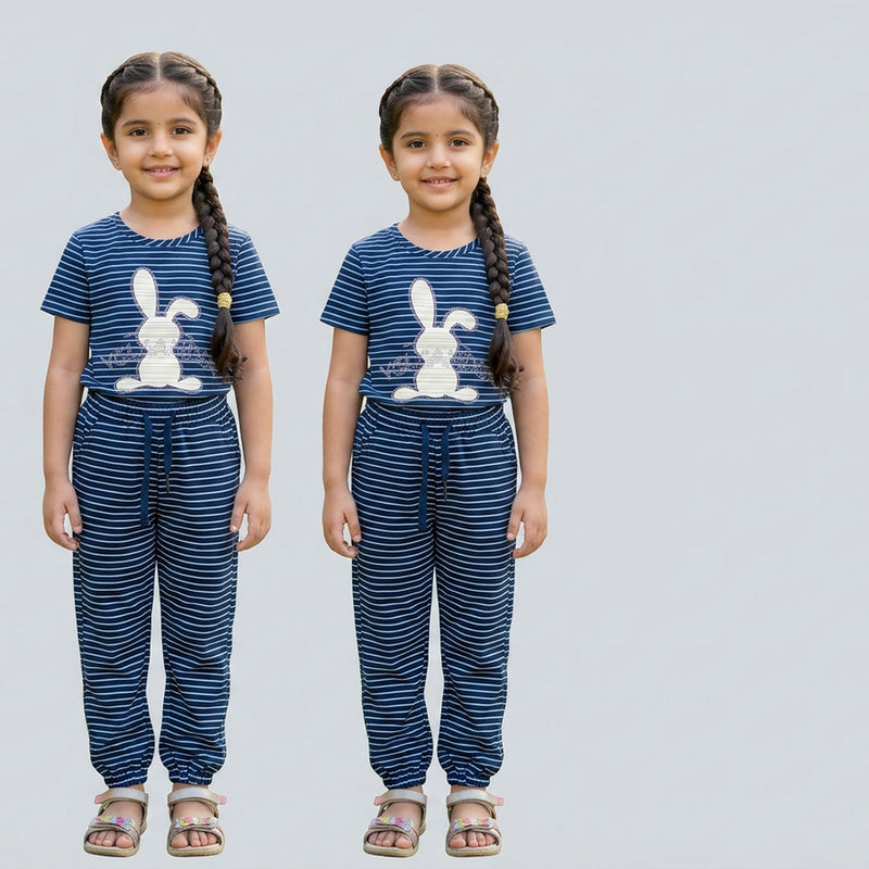 Little girl wearing navy blue striped cotton co-ord set with bunny print top and matching jogger pants for kids