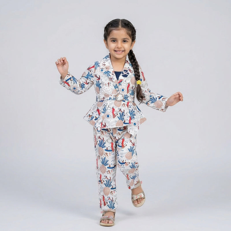 Girl wearing printed peplum co-ord set with blazer style top and matching pants stylish party wear outfit for kids