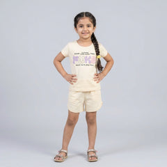 Little girl wearing printed t-shirt and matching shorts co-ord set casual summer outfit for kids