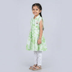 Girl wearing mint green floral A-line dress with white leggings stylish casual and party wear outfit for kids