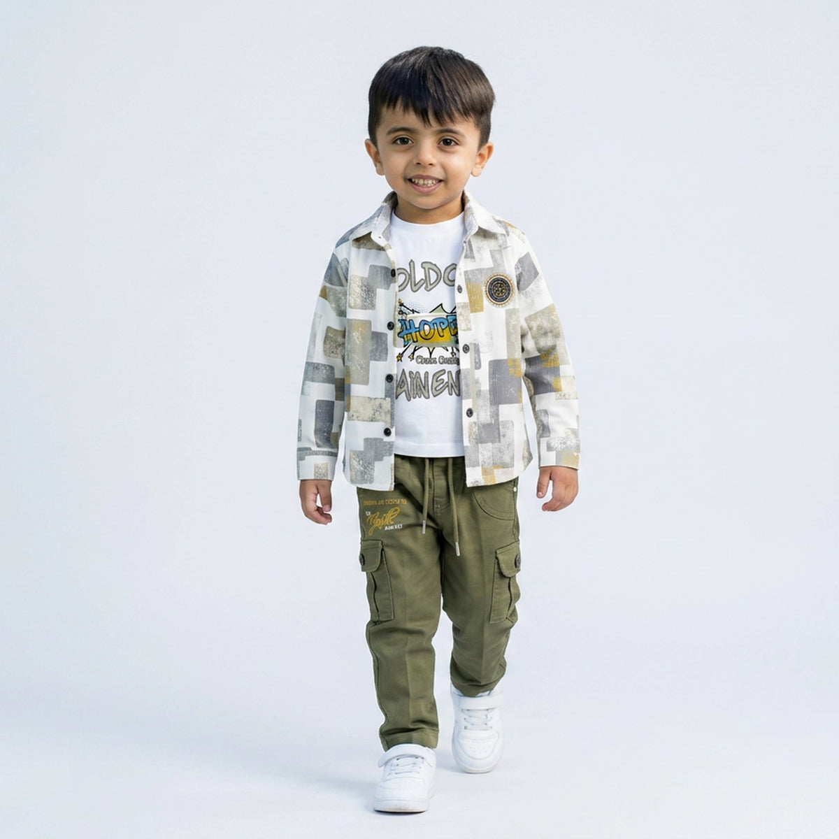 Young boy wearing printed shirt with graphic t-shirt and olive cargo pants kids casual 3 piece outfit