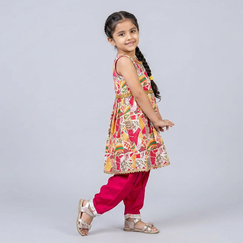 Young girl wearing a colorful traditional outfit on a light gray background
