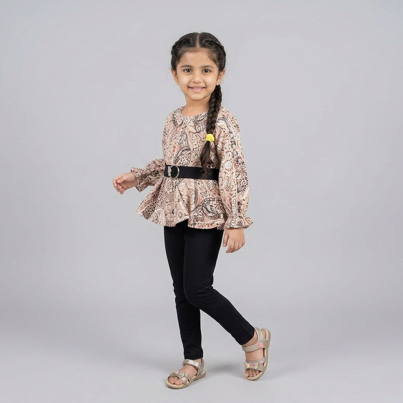 Girl wearing beige paisley print peplum top with black leggings stylish co-ord set for kids casual and party wear