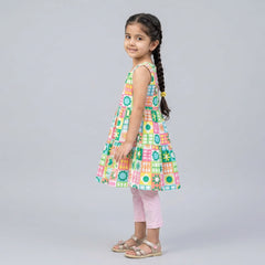 Girl wearing multicolor printed layered tunic top with pink leggings stylish casual outfit set for kids with flutter sleeves and teddy bear detail