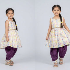 Young girl wearing a floral dress and purple pants - ethnic dress for girls